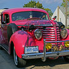 "PINK LLOYD" : I would like to introduce you to a genuine character by the name of  "PINK LLOYD" MacLean of Point Edward, (Sarnia) Ontario, Canada. While passing through this tiny village recently, my wife and I literally stumbled into the "PINK" sitting upon his lofty perch, pontificating to the feeble minions who stop before his humble abode. Holding public court, "LLOYD" awaits the world to congregate before him, to hear him speak eloquently of worldly deeds, colloquial witticisms and off-coloured banter for all but the most delicate of ears.
